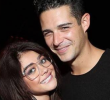 Celebrity Couple: Sarah Hyland & Wells Adams Get Cozy on Super Bowl Date Night